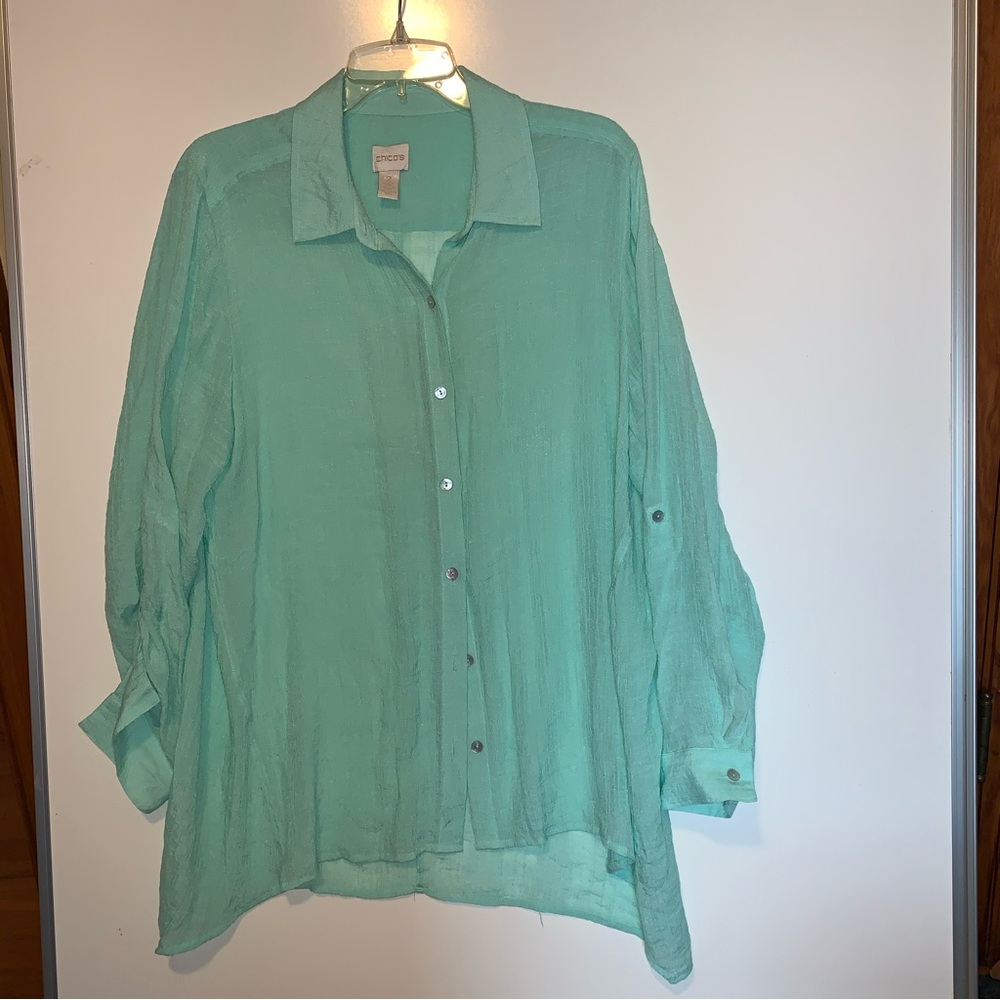 Chico’s woman light green rayon blouse. Size 2